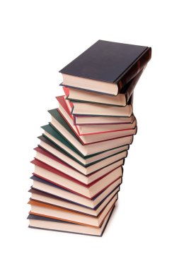 Eski kağıt kitap beyaz zemin üzerine yığını