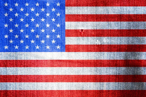 デニム生地の背景にアメリカの国旗 — ストック写真