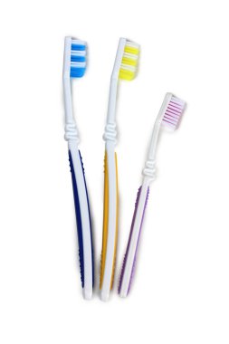 diş fırçası ve beyaz zemin üzerine tüp