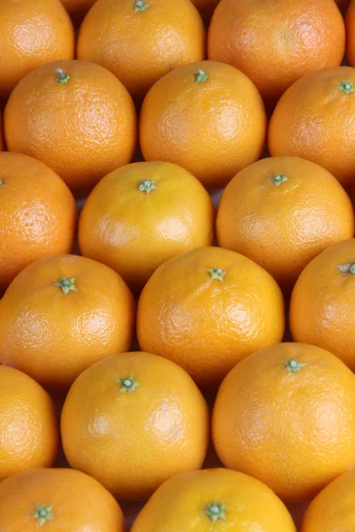 Ripe yellow orange on table background