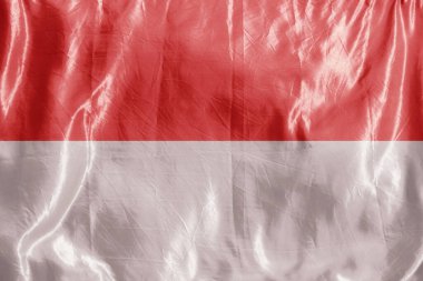 Eyalet bayrağı rüzgarda dalgalanıyor. Tekstil üzerine renkli arkaplan