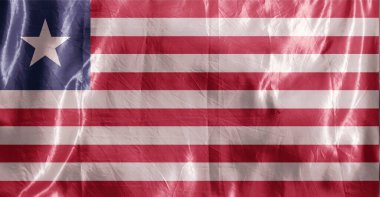 Eyalet bayrağı rüzgarda dalgalanıyor. Tekstil üzerine renkli arkaplan