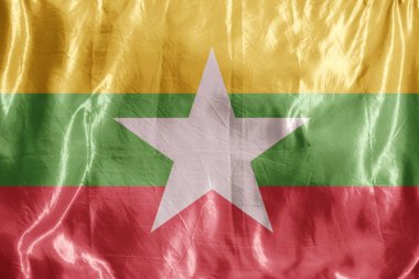 Eyalet bayrağı rüzgarda dalgalanıyor. Tekstil üzerine renkli arkaplan