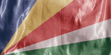 Eyalet bayrağı rüzgarda dalgalanıyor. Tekstil üzerine renkli arkaplan