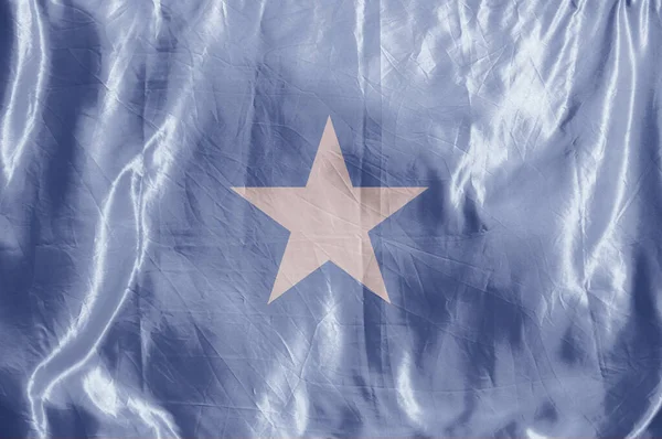 Bandera Del Estado Ondeando Viento Fondo Coloreado Sobre Textiles —  Fotos de Stock