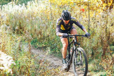 October 14, 2018 - Minsk, Belarus: 2018 Olympic Cross Country Cup XCO in Medvezhino man riding bicycle along forest trail
