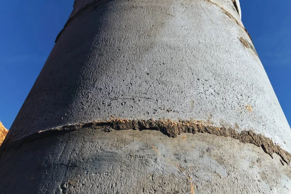 Concrete well at the construction site for water pipes