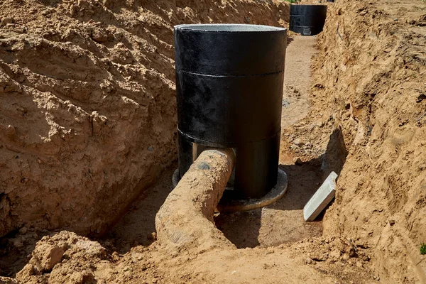 Entering Old Metal Water Pipe Reinforced Concrete Well Reconstruction Old — Stock Photo, Image