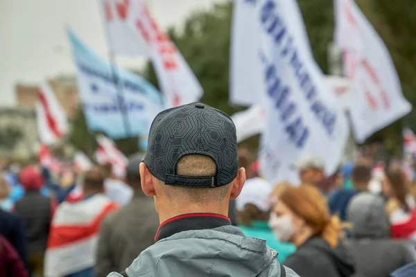 A man standing at a peaceful demonstration