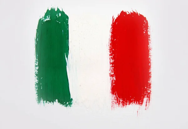 colorful paint stains of flag of Italy colors on white background. abstract art