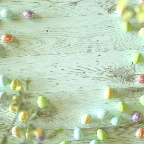 Œufs de Pâques colorés sur bois vert menthe — Photo