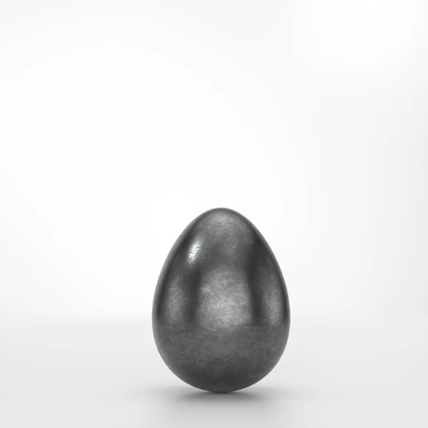Un huevo de Pascua negro sobre fondo blanco —  Fotos de Stock