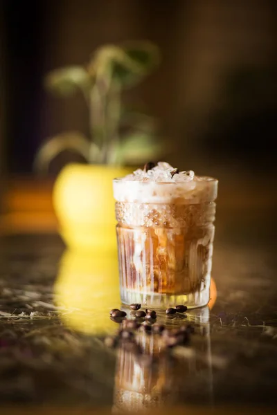 fresh, cold coffee cocktail with ice in restaurant