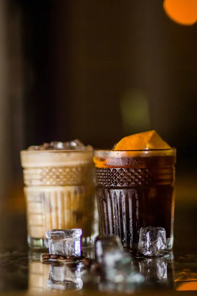 fresh, cold coffee cocktails with ice and citrus in restaurant