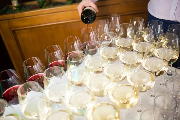 Waiter pouring wine — Stock Photo, Image