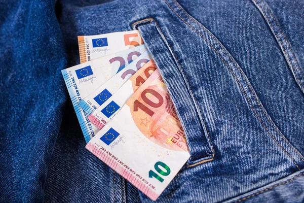 Euro banknote in jeans — Stok fotoğraf