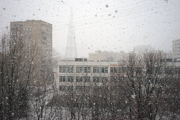 MOSCOW, RUSSIA - 13 MAECH 2019 Shuhov's tower and school and heavy snow storm