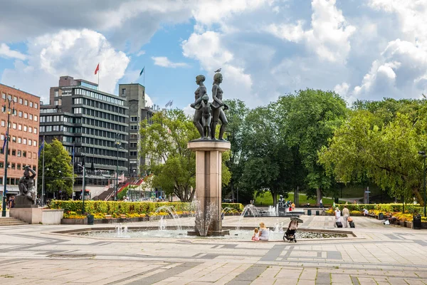 Oslo, Norway - July 16, 2025: Christian IV's Glove monument at Christiania Torv square in Oslo, featuring a bronze pointing hand with fountain water display.