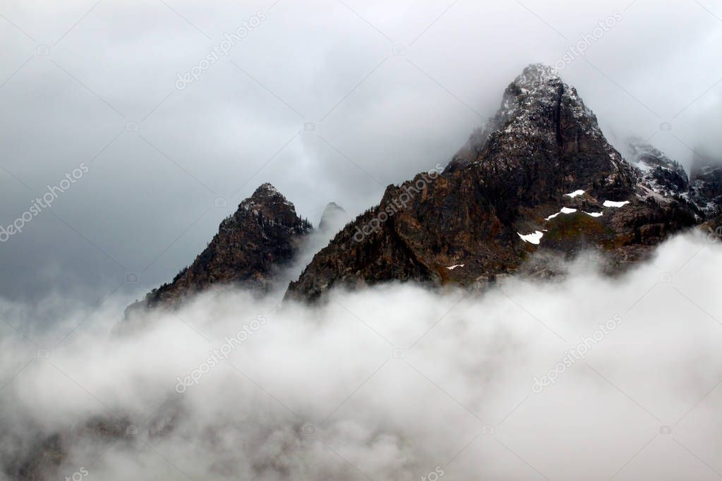 Foggy mountains of the Teton Range in western Wyoming