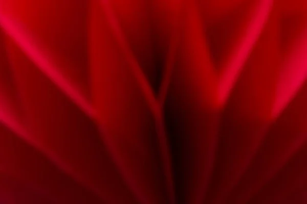 ぼやけた赤いハニカム ポンポン紙ボール装飾のクローズ アップの詳細 — ストック写真