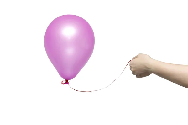 单粉红色气球握在白色背景的手隔绝 — 图库照片