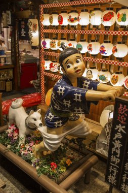 Kyoto, 8 Ekim 2016: Okonomiyaki Restoran Issen Yoshoku Kyoto, Japonya'nın detay. Bu Japon lezzetli gözleme Restoran köpek çocuk hırsız kovalama, işareti için ünlüdür