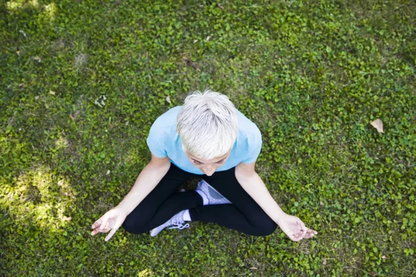Top View Senior Woman Does Lotus Pose Relaxation Park — Stock Photo, Image