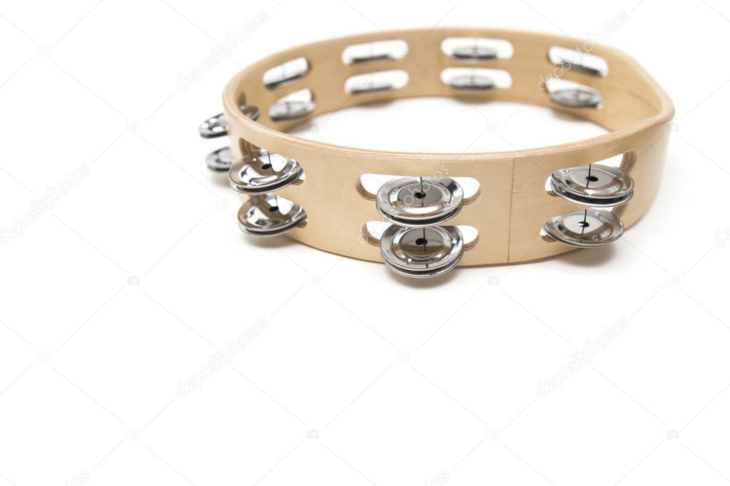 Single  tambourine isolated on the white background