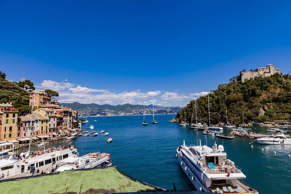 PORTOFINO, ITALY - APRIL 29, 2017: Detail of Portofino bay in Italy. Portofino is one of the most popular resort towns on the Italian Riviera.