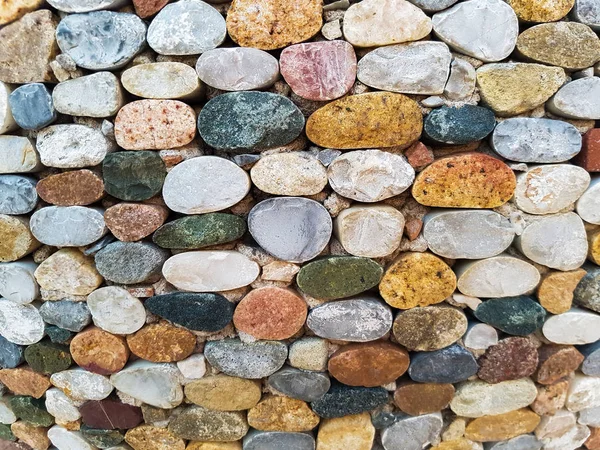 Деталь Красочных Круглых Камней Фоне Стены — стоковое фото