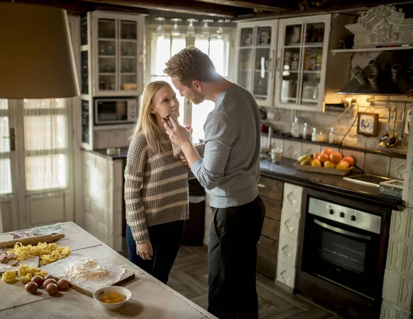 Loving Couple Preparing Pasta Rustic Kitchen — Stock Photo, Image