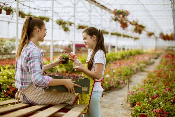 Two Young Florists Enjoying Work Greenhouse — Stock Photo, Image