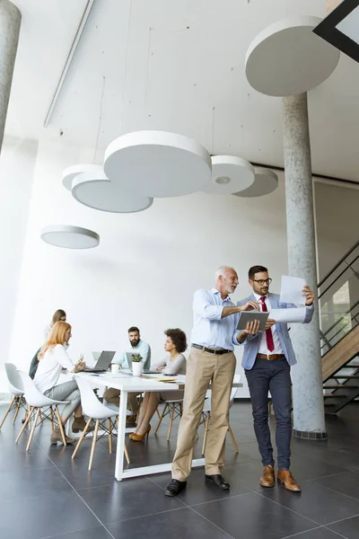 Two Successful Businessmen Standing Modern Office — Stock Photo, Image