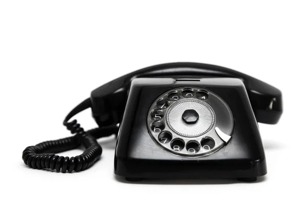 在白色背景查出的黑复古电话 — 图库照片