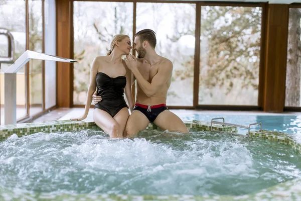 Loving Young Couple Relaxing Spa Center Swimming Pool — Stock Photo, Image