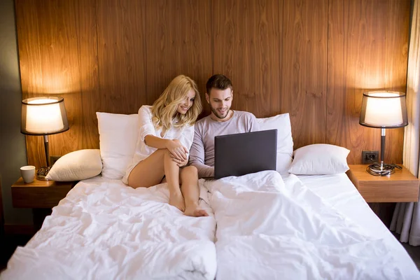 Loving Young Couple Surfing Internet Laptop Bed Home — Stock Photo, Image