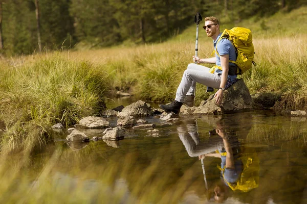 Handsome Young Hiker Sitting Resting Next Mountain River — Stock Photo, Image