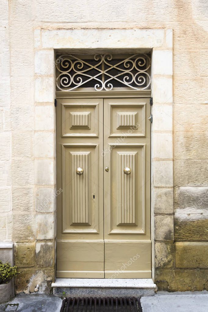 View at traditional front door from building on Malta