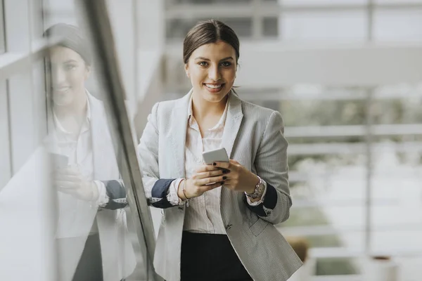 Pretty Young Business Woman Stands Stairs Office Use Mobile Phone — Stock Photo, Image