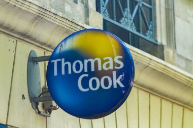 NIMES, FRANCE - APRIL 29, 2019: Detail from the store front of Thomas Cook office in Nimes, France. Thomas Cook is a British global travel company.