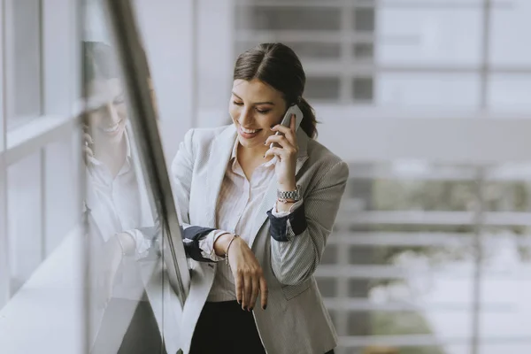 Pretty Young Business Woman Stands Stairs Office Use Mobile Phone — Stock Photo, Image