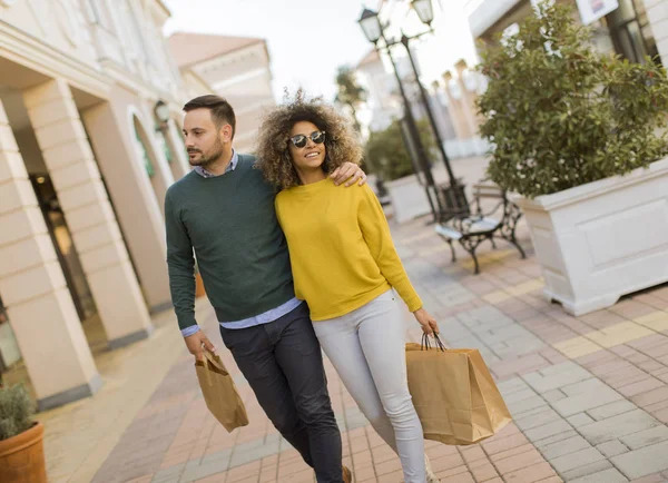 Beautiful Young Multiethnic Couple Paper Bags Enjoying Shopping Having Fun — Stock Photo, Image