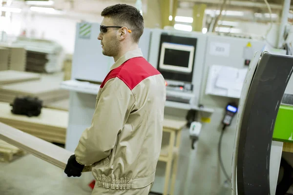 Joven Guapo Trabajando Fábrica Muebles Imagen de archivo