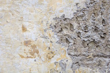 Eski sarı taş duvar dokusunun yakın çekim