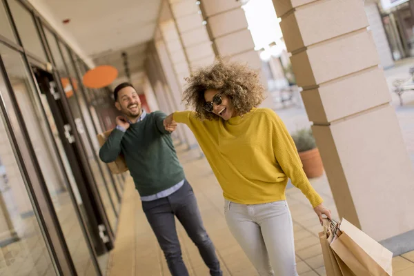 Beautiful Young Multiethnic Couple Paper Bags Enjoying Shopping Having Fun — Stock Photo, Image