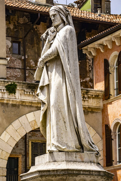 View at monument of poet Dante Alighieri in the Piazza dei Signori in Verona, Italy