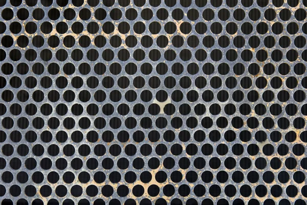 Detail Der Grauen Metalloberfläche Mit Schwarzen Runden Löchern — Stockfoto