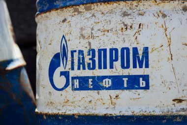 GERGETI, GEORGIA - APRIL 30, 2019: Detail of the old oil barrel with Gazprom Neft sign in Gegeti, Georgia. Gazprom Neft is the third largest oil producer in Russia. clipart
