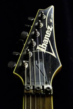 BELGRADE, SERBIA - APRIL 17, 2017: Detail of the Ibanez guitar. Ibanez is a Japanese guitar brand based in Nagoya. clipart