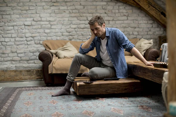 Stressed Young Man Sitting Apartment Room — Stock Photo, Image